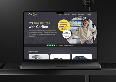 CarBee website design on laptop